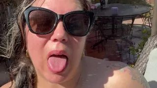 Hot Mom in bikini stripping and squirting in the backyard sun.