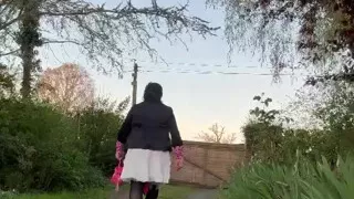 In casual attire with a white skirt one evening