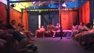 Mature Brunette Devours Multiple Throbbing Cocks in Sloppy Gangbang