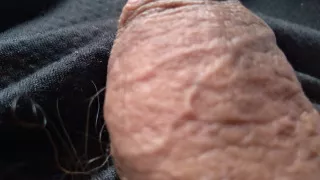 young gay man enjoys his huge cock in the air