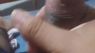 Man lying down masturbates while his neighbor is softening with his wife