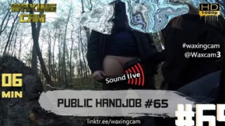 65 She Publicly Handjob to a Guy