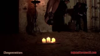 A Witch Is Dangling Over Small Flames