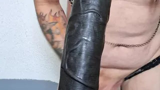 I suck with the condom a dildo in public in lingerie