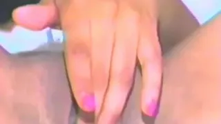 An Ebony Babe Fucks Herself with Lots of Dildos