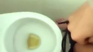 Tattooed Twink Is Pissing in Waterpark Piss Filled Toilet