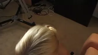 Blonde milf sucks a huge cock as the boy films her