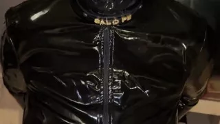 MILF in Bitbit Gag in Chained Latex Dress