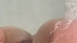 Massaging my pussy in the bath