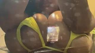Busty Ebony Girl Rubbing Oiled Tits on a Clear Chair & Riding Her Dildo