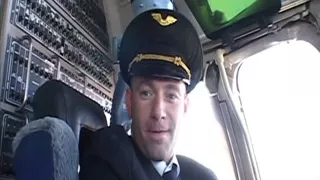 Randy pilot fondles sexy brunette in the cockpit