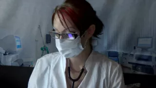 Doctor eating in medical mask and gloves