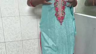 Indian Housewife in bathroom