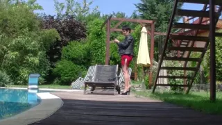 Granny enjoys dildo in garden