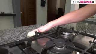 Horny MILF enjoys rubbing her clit on the kitchen floor