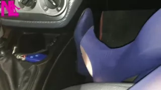 Dangling in Blue Pantyhose and Blue Flats on a Gas Station