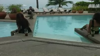2 sexy Latina's presenting latex fetish in the pool and on the beach