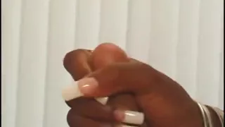 Hot black nurse in stockings gets pounded and creamed by a white dude in bed