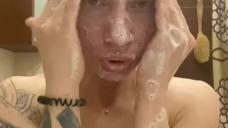 the girl came from a group sex and washed her mouth and face