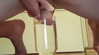 Cum in glases cup full of water