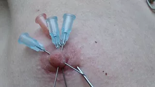Tied to the cross whipped nipples