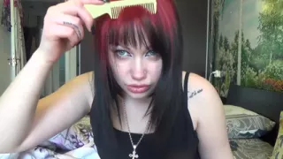 Brushing my hair with little and big brush and by long nails