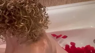 Merce Masturbates in a Bathtub Full of Petals with the Shower Head