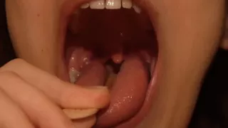 I Eat the Popsicle and Suck on It. After I Eat the Popsicle, I Examine My Mouth and Throat with the Popsicle Stick