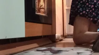 Transvestite cleans the fridge and eats his cum