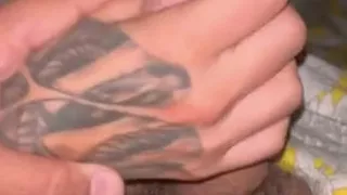 Tattooed amateur MILF handjob