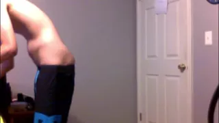 Young Guy Fills His Stomach with Water