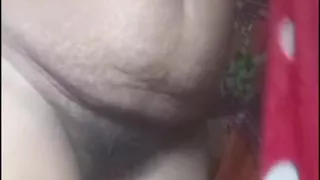 Aunty is oiling her pussy