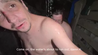 Soapy naked bodies in a rural shower