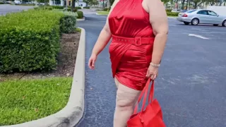 Beautiful Woman Walking Outdoors in  Parking Lot Showing off for Strangers