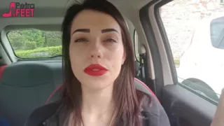 Good looking Petra smoking in her car