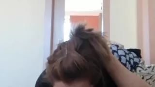 While he watches TV, I give him a blowjob