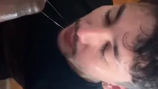 Cute White Boy Receives Cum From a Black Man in His Mouth and Face.