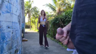 Risky handjob for hot redhead on the walk in the park in public!