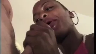 Ebony hottie sucks big white dick in bed