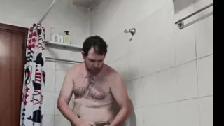 Naked boy in the shower