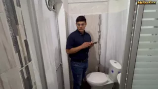 Teacher his student in the bathroom.
