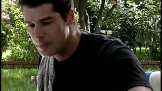 An older woman talks to her partner in a bra at home 2 scenes in 1
