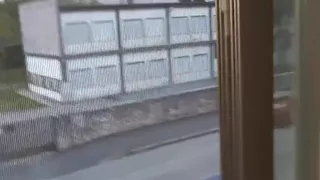 Naked in Front of the Window on a Chair