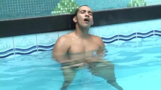 Latin dilf jerking off in the pool
