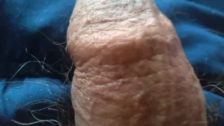 Young man with oil has a fetish for his penis
