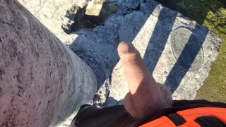 Jock in Fishnet Jerks His Big Fat Cock and Cums on Top of the Mountain