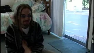 She pulls her legs back to give him a footjob
