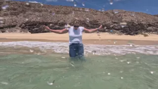 Girl Wetting Jeans in the Ocean and Swimming in Wet White T-shirt