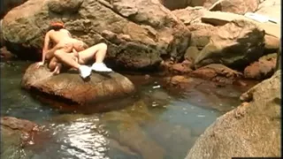 Brunette in Orange Cap Fucked on Rocks by Natural Pool
