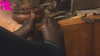 Warming up My Hosed Feet at the Fireplace